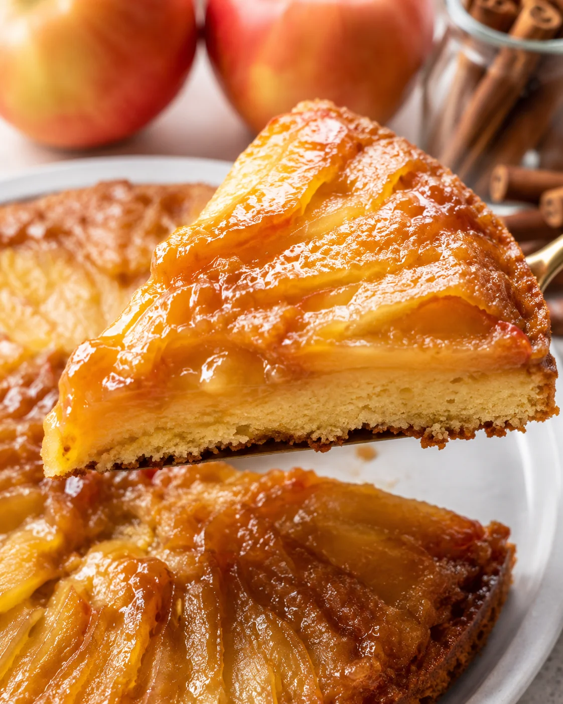 Delicious apple upside down cake with caramelized apples and soft cake slices.