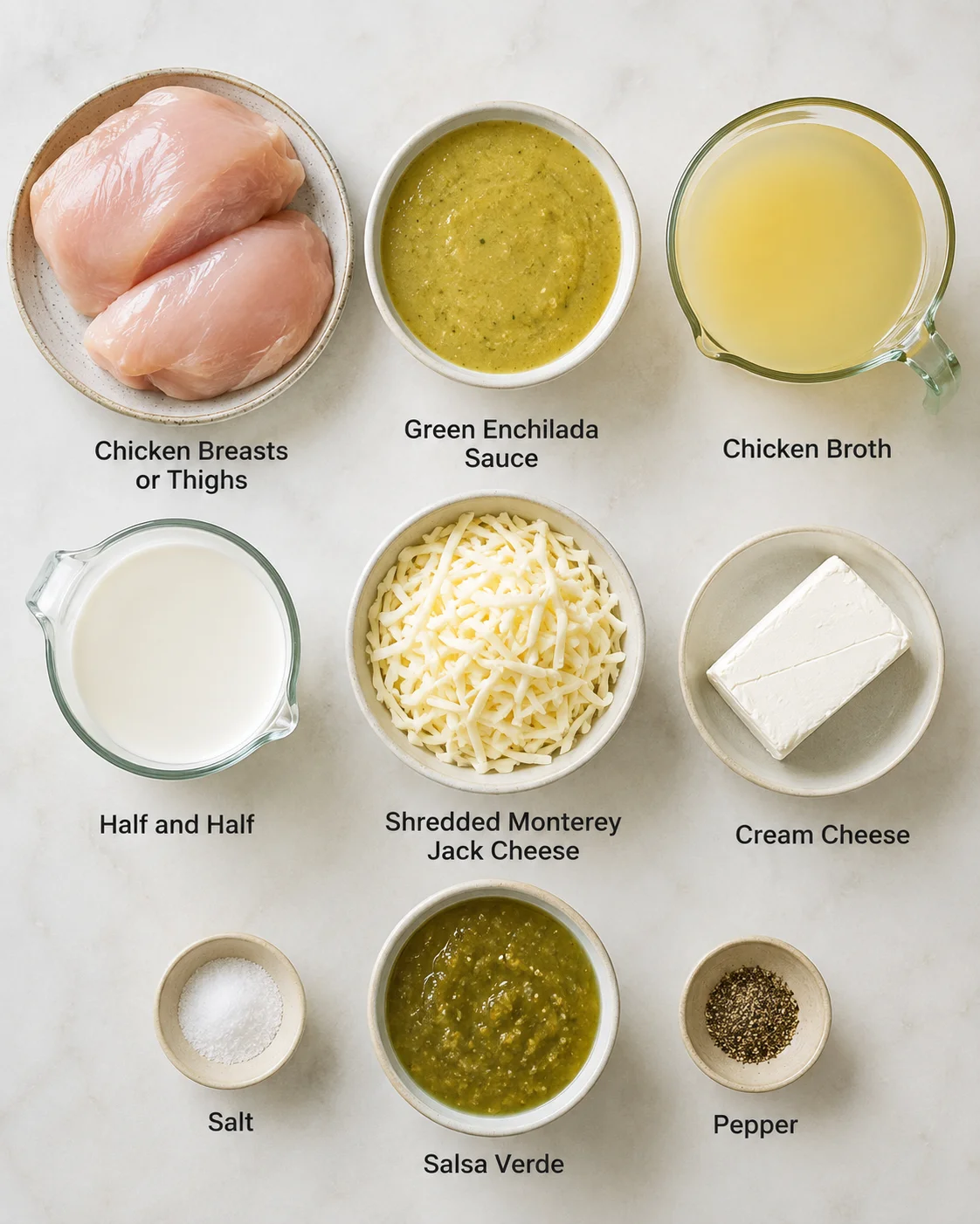 Top-down layout of ingredients for creamy green enchilada chicken soup including chicken, green enchilada sauce, broth, half and half, cheeses and cream cheese